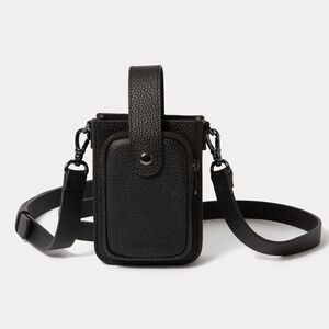 Hailey Holster CROSSBODY PHONE BAG in black / gold